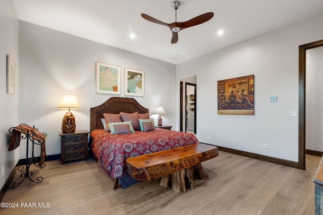 bedroom featuring ceiling fan and light hardwood / wood-style floors