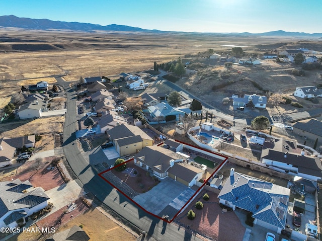 drone / aerial view featuring a mountain view