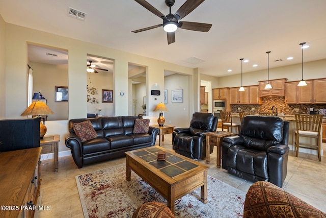 12691 E De La Cruz St, Dewey-Humboldt, AZ 86327 - living room with a ceiling fan and light tile patterned floors