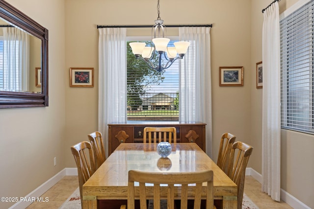 12691 E De La Cruz St, Dewey-Humboldt, AZ 86327 - dining area featuring a chandelier and light tile patterned floors