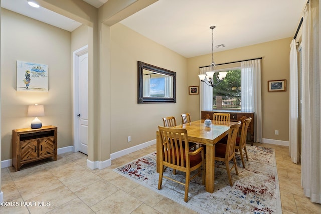 12691 E De La Cruz St, Dewey-Humboldt, AZ 86327 - dining space with a chandelier and light tile patterned floors
