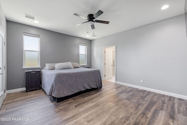 7921 E Las Palmas Dr, Prescott Valley, AZ 86314 - bedroom with wood finished floors, baseboards, recessed lighting, and ceiling fan