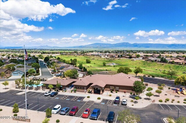 aerial view featuring a mountain view and a residential view