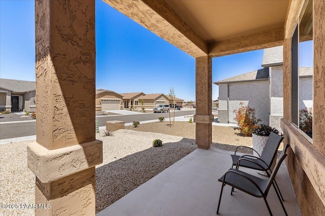 view of patio / terrace with a residential view