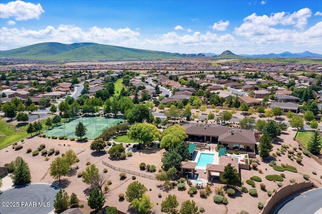 birds eye view of property with a residential view and a mountain view