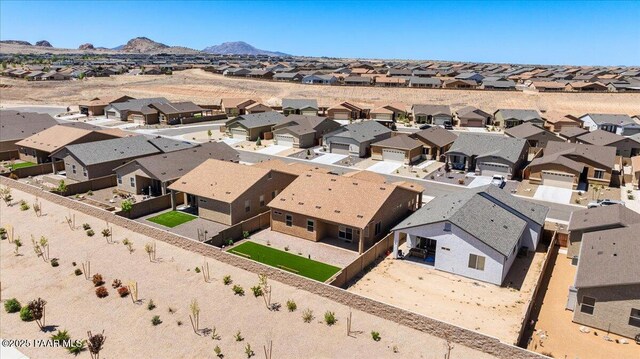 bird's eye view with a residential view and a mountain view