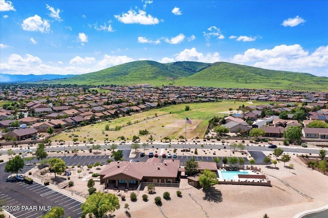 drone / aerial view featuring a mountain view and a residential view
