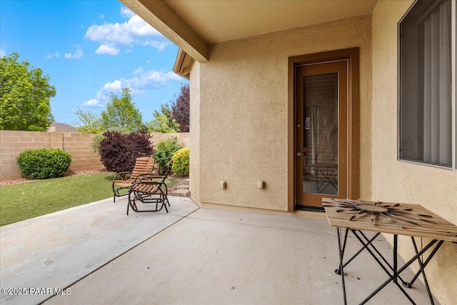 view of patio / terrace with fence