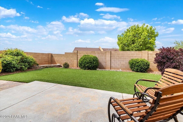 view of patio featuring a fenced backyard