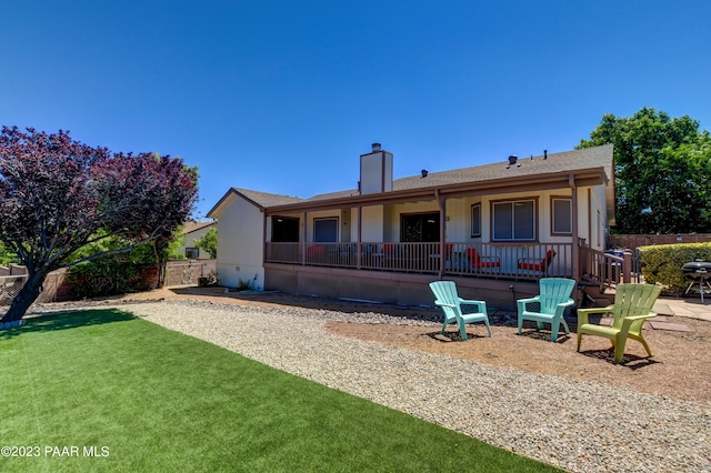 3096 Montana Dr, Prescott, AZ 86301 - back of property with a yard, a patio, fence, and a chimney