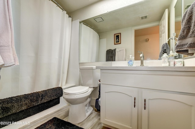 3096 Montana Dr, Prescott, AZ 86301 - full bath with vanity, wood finished floors, visible vents, and toilet