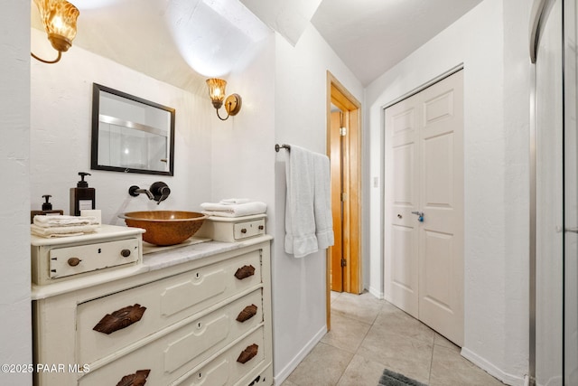 bathroom featuring vanity and tile patterned flooring