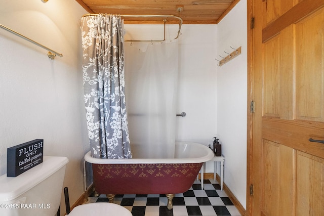 bathroom featuring toilet and wooden ceiling