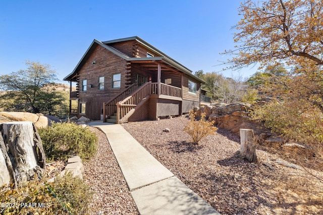 view of log home