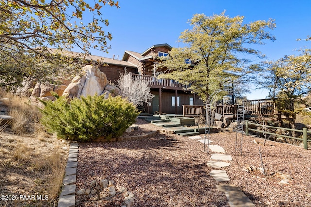 exterior space featuring a wooden deck