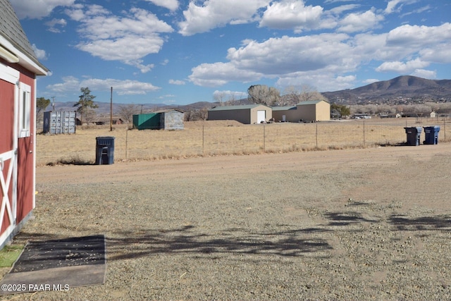 view of yard with a mountain view