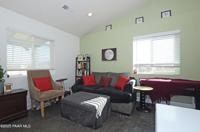 living room featuring vaulted ceiling