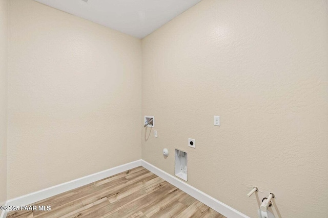 8595 N Isabella Ct, Prescott Valley, AZ 86315 - washroom with laundry area, light wood finished floors, hookup for a washing machine, and hookup for a gas dryer