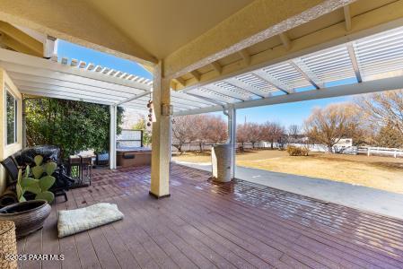 view of patio featuring a deck and a pergola