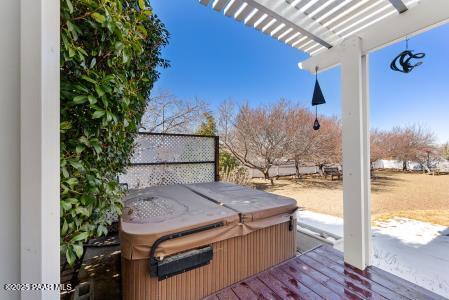 987 Kristin St, Chino Valley, AZ 86323 - wooden deck featuring a hot tub and a pergola