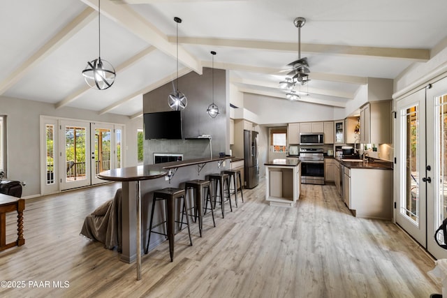 707 Apache Dr, Dewey-Humboldt, AZ 86327 - kitchen featuring appliances with stainless steel finishes, french doors, and dark countertops