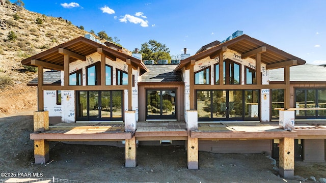 back of house featuring french doors