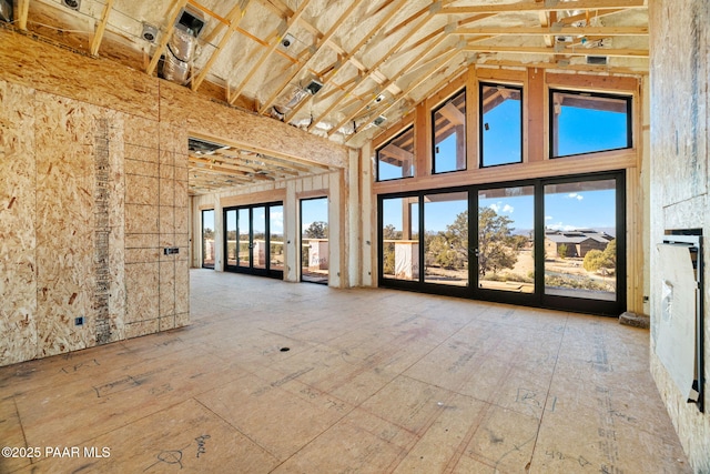 interior space with high vaulted ceiling