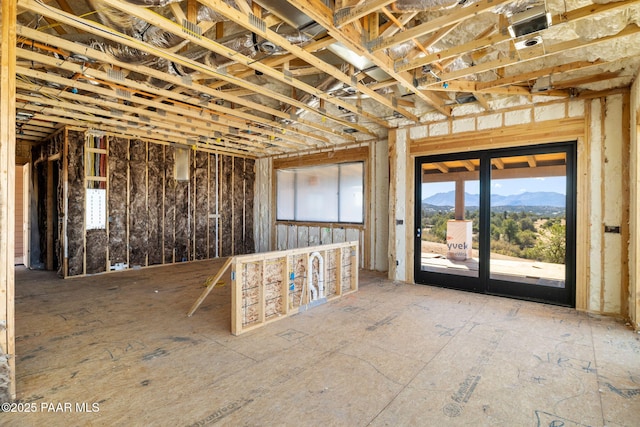 miscellaneous room with a mountain view