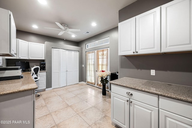 930 S Kerasi Ct, Dewey-Humboldt, AZ 86327 - kitchen with ceiling fan, white cabinets, recessed lighting, light countertops, and light tile patterned floors