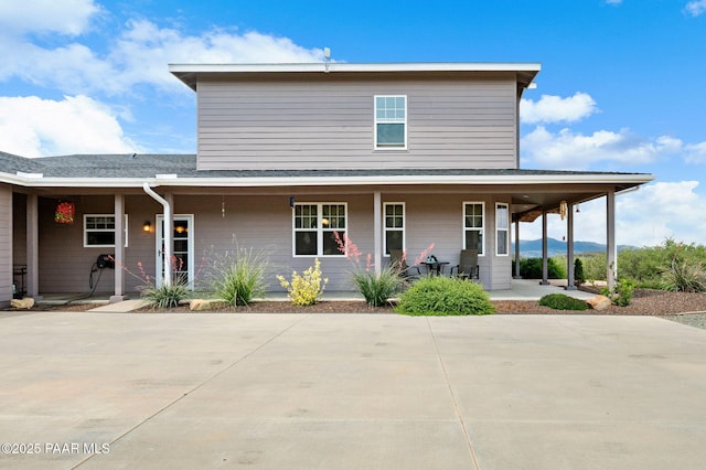 930 S Kerasi Ct, Dewey-Humboldt, AZ 86327 - view of front of property with covered porch and a shingled roof