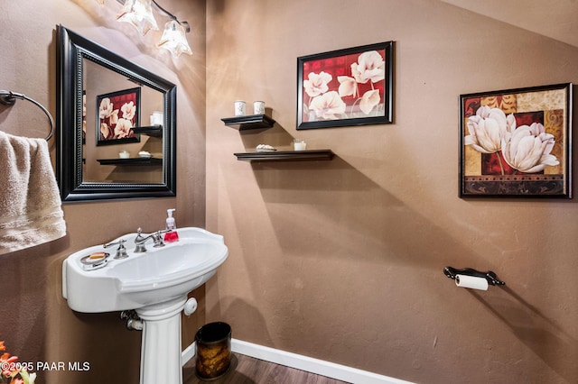 930 S Kerasi Ct, Dewey-Humboldt, AZ 86327 - bathroom featuring wood finished floors and baseboards