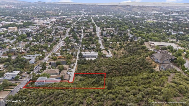 drone / aerial view with a residential view and a mountain view