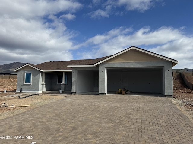 single story home with a garage