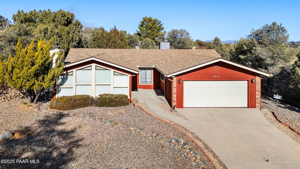 ranch-style home with a garage