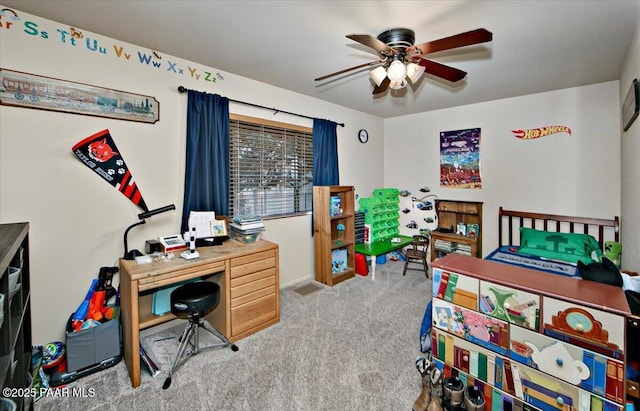 bedroom featuring light carpet and ceiling fan