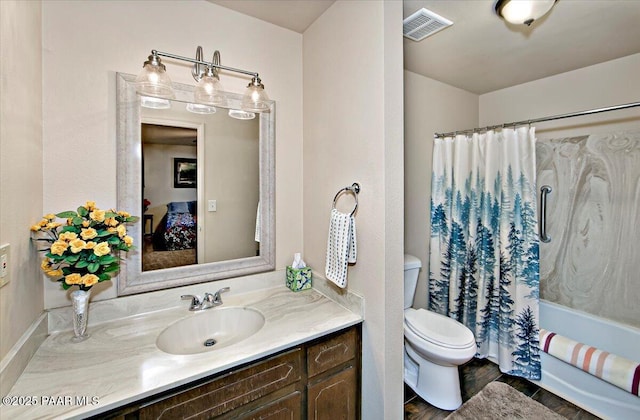 full bathroom with toilet, vanity, and shower / bathtub combination with curtain