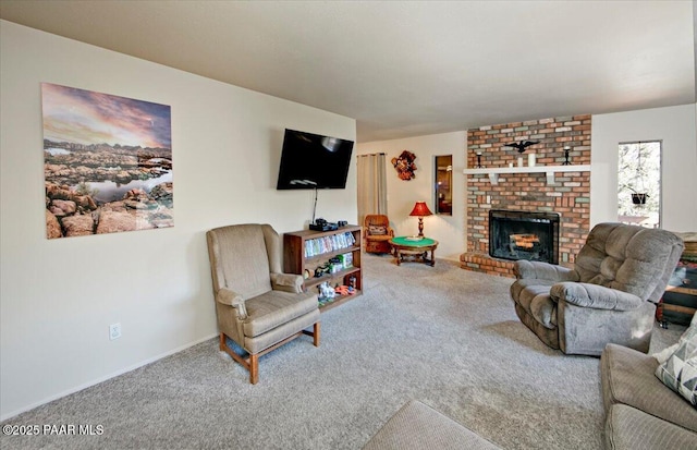 carpeted living room featuring a fireplace