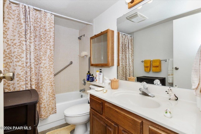 full bathroom with shower / bath combo, toilet, and vanity