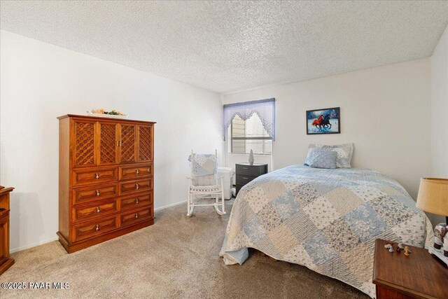 333 W Leroux St Unit D4, Prescott, AZ 86303 - bedroom featuring light carpet and a textured ceiling