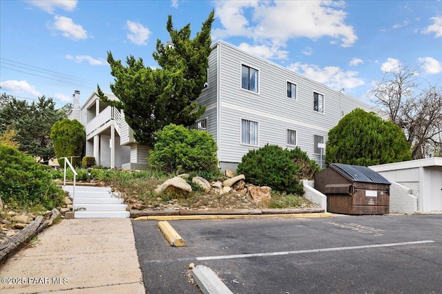333 W Leroux St Unit D4, Prescott, AZ 86303 - view of front of home featuring uncovered parking and a shed