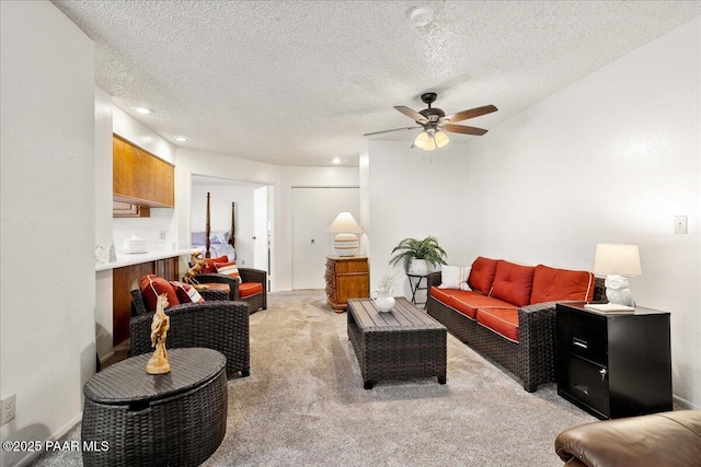 333 W Leroux St Unit D4, Prescott, AZ 86303 - living area with light carpet, ceiling fan, and a textured ceiling