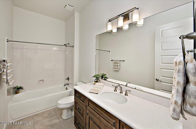 bathroom with washtub / shower combination, tile patterned flooring, vanity, and toilet