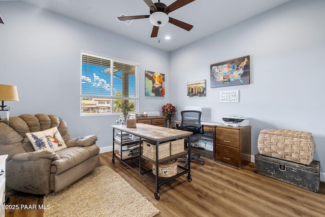 office featuring ceiling fan and hardwood / wood-style floors