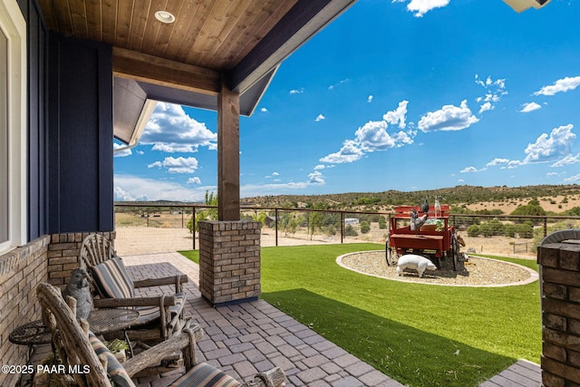 view of patio / terrace featuring a rural view