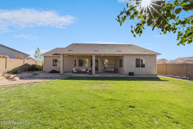 5486 N Jarvis Ct, Prescott Valley, AZ 86314 - rear view of house with a lawn, a fenced backyard, a patio area, and stucco siding