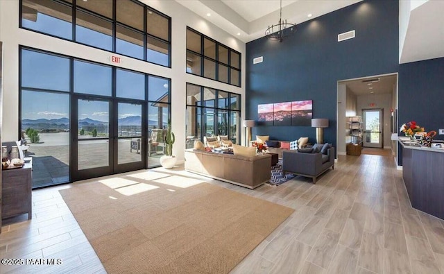 community lobby featuring visible vents and a mountain view