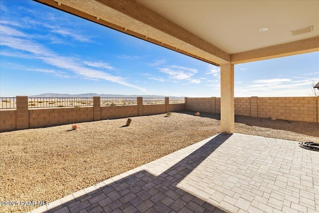 view of patio / terrace with visible vents and a fenced backyard