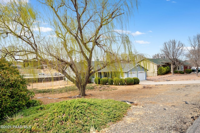 view of front of home featuring an attached garage and driveway