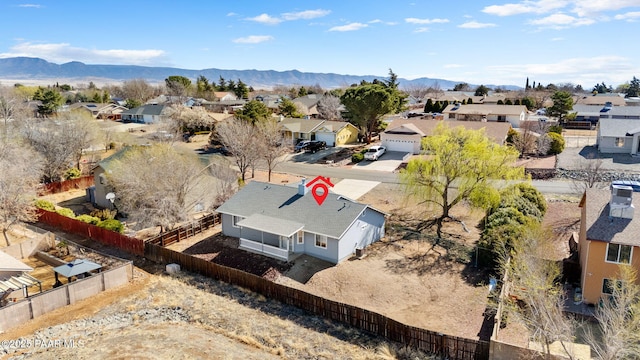 drone / aerial view with a mountain view and a residential view