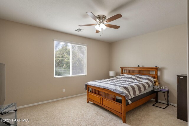 13109 E Gonzalez St, Dewey-Humboldt, AZ 86327 - bedroom featuring baseboards, light colored carpet, and a ceiling fan